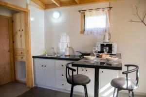 Kuchyň nebo kuchyňský kout v ubytování Cabañas Raco