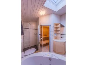 Koupelna v ubytování exklusives skandinavisches Ferienhaus + 13 fotografií