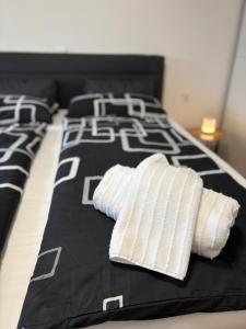 Postel nebo postele na pokoji v ubytování Moderne Wohnung mit toller Aussicht