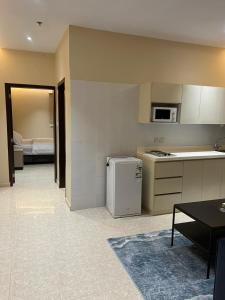 Η κουζίνα ή μικρή κουζίνα στο مرج الزيتون للشقق المخدومة