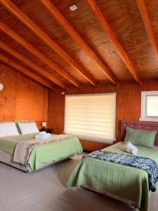 Ένα ή περισσότερα κρεβάτια σε δωμάτιο στο Hotel Gran Luna