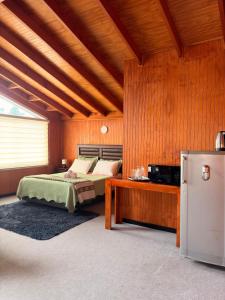 Ένα ή περισσότερα κρεβάτια σε δωμάτιο στο Hotel Gran Luna +28 φωτογραφίες