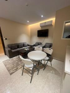 Μια τηλεόραση ή/και κέντρο ψυχαγωγίας στο مرج الزيتون للشقق المخدومة