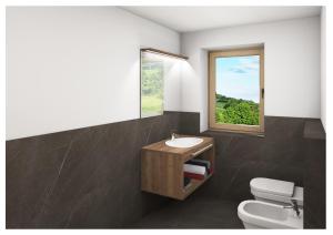 Un baño con lavabo, inodoro y ventana. en Historic Residence Barbara, en Colle Isarco 73 fotos más
