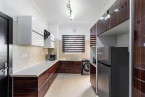 Η κουζίνα ή μικρή κουζίνα στο Luxury & Classy 2Bedroom Apartment