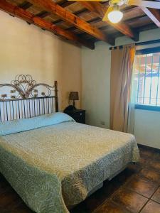 Postel nebo postele na pokoji v ubytování Portal del Chamán