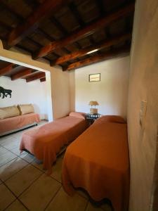 Postel nebo postele na pokoji v ubytování Portal del Chamán + 18 fotografií