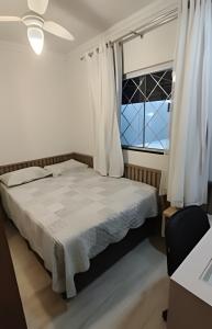 Ένα ή περισσότερα κρεβάτια σε δωμάτιο στο Apto. próx. Perini Business Park, UFSC & Whirlpool