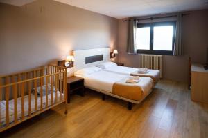 Ένα ή περισσότερα κρεβάτια σε δωμάτιο στο Hotel Port 1730