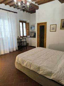 Ένα ή περισσότερα κρεβάτια σε δωμάτιο στο La casa di Fannie