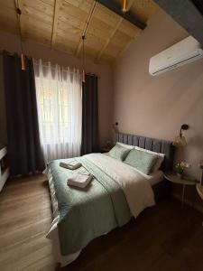 Ένα ή περισσότερα κρεβάτια σε δωμάτιο στο La Casa di Marsy