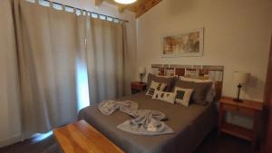 Ένα ή περισσότερα κρεβάτια σε δωμάτιο στο Departamento "Avanti"