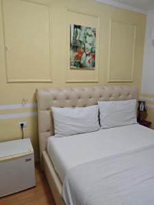 Postel nebo postele na pokoji v ubytování Center Tirana Rooms