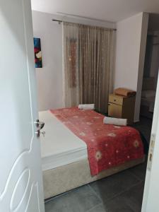 Ένα ή περισσότερα κρεβάτια σε δωμάτιο στο Center Rooms