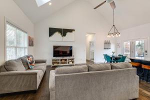 a living room with two couches and a tv at Hot Tub and Yard Temptation Stays Home in Roanoke in Cave Spring