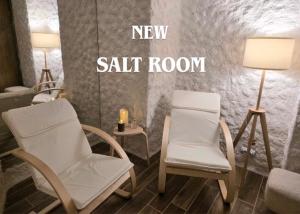 a room with two chairs and a salt room at BOUTIQUE Hotel ENTRY E in Bansko +69 photos