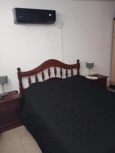 Ένα ή περισσότερα κρεβάτια σε δωμάτιο στο La casa de nona