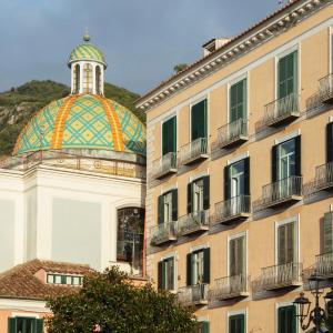 a building with a dome on top of a building at ViaRomaHome - Salerno in Salerno