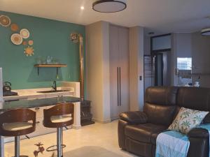 Η κουζίνα ή μικρή κουζίνα στο Calypso Sunset