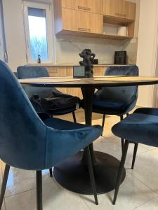 Η κουζίνα ή μικρή κουζίνα στο 3 Barát Apartman