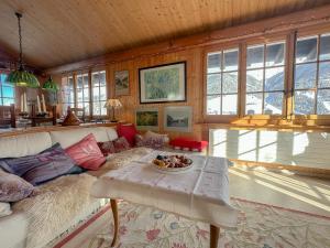 Χώρος καθιστικού στο Chalet le Moulin - calme, nature, cheminée, vue