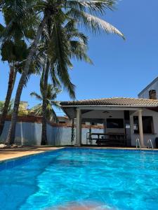 Bazén v ubytování Villa das Araras Residence nebo v jeho okolí