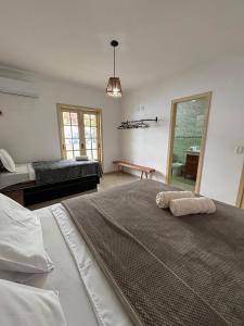 Postel nebo postele na pokoji v ubytování Villa das Araras Residence