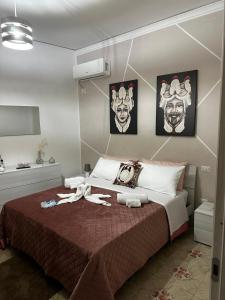 Ένα ή περισσότερα κρεβάτια σε δωμάτιο στο Casa vacanze I mori