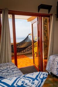 Ένα ή περισσότερα κρεβάτια σε δωμάτιο στο AST Surf Hotel