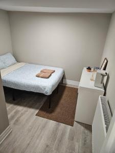 Postel nebo postele na pokoji v ubytování Superb Guest House In Downtown-Self Checkin& Fast Wifi + 4 fotografie