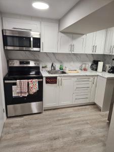 Kuchyň nebo kuchyňský kout v ubytování Superb Guest House In Downtown-Self Checkin& Fast Wifi