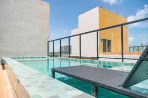 Swimmingpoolen hos eller tæt på Flats no Mares de Cabo Branco by QAVI