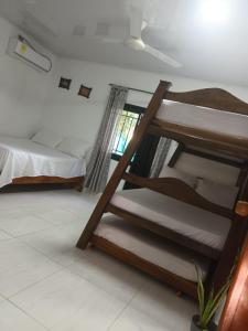 Ένα ή περισσότερα κρεβάτια σε δωμάτιο στο La casa en la estación cocornà