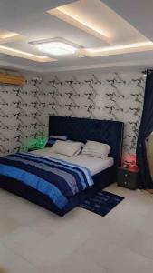 Un pat sau paturi într-o cameră la Casamia