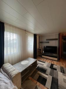 En eller flere senge i et værelse på Wiesbaden Mainz kleines Haus mit Garten Grill