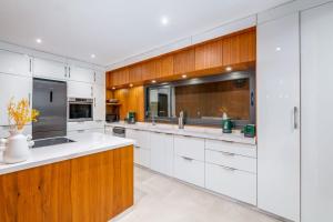 Η κουζίνα ή μικρή κουζίνα στο Location luxe