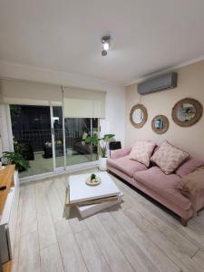 Posezení v ubytování Amelia depto