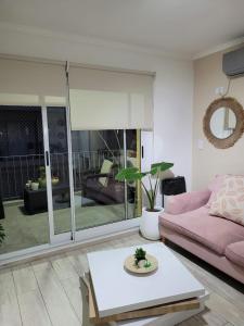 Posezení v ubytování Amelia depto