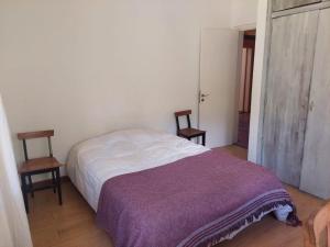 En eller flere senge i et værelse på La alborada - Casa de campo