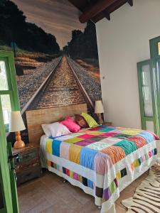 Postel nebo postele na pokoji v ubytování Rancho São Francisco de Assis - 2 suítes