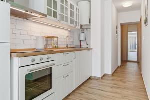 Kuchyň nebo kuchyňský kout v ubytování Casa 1920 Apartment