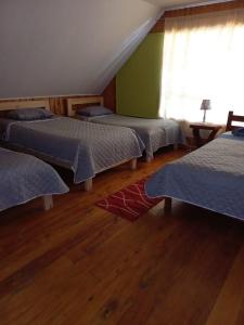 Ένα ή περισσότερα κρεβάτια σε δωμάτιο στο Hospedaje Green Paradise +2 φωτογραφίες