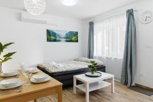 Postel nebo postele na pokoji v ubytování Casa 1920 Apartment