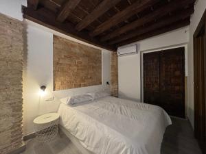 Ένα ή περισσότερα κρεβάτια σε δωμάτιο στο El Torreón 1870 +1 φωτογραφίες