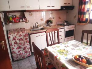 Η κουζίνα ή μικρή κουζίνα στο El Remanso centrico +19 φωτογραφίες