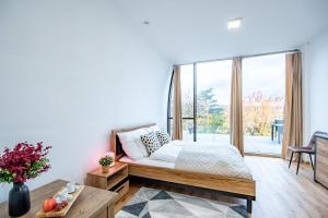 Ένα ή περισσότερα κρεβάτια σε δωμάτιο στο Scenic view - Sauna - Spacious