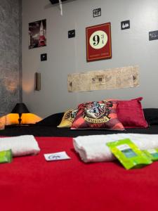 Ένα ή περισσότερα κρεβάτια σε δωμάτιο στο Suíte Harry Potter - Pousada Castelo do Luar