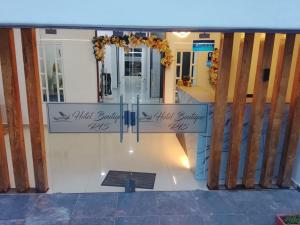 a lobby with a sign that reads main building at Casa Hotel AeroClubR15 in Villavicencio