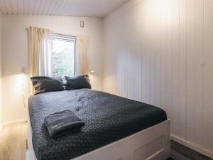 Ένα ή περισσότερα κρεβάτια σε δωμάτιο στο 4 star holiday home in Hornbæk