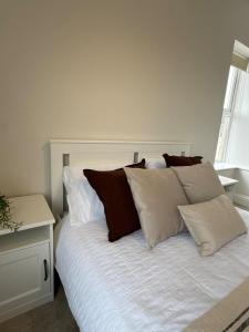 Ένα ή περισσότερα κρεβάτια σε δωμάτιο στο Central Aldershot Private room, Near Station & Town Centre